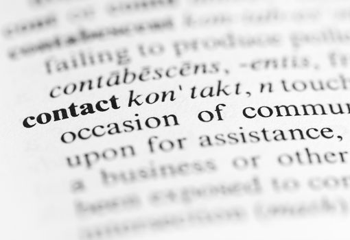 Close up of the word 'contact' and its definition in the dictionary