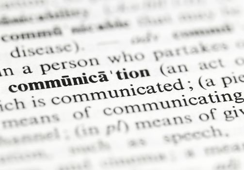 Close up of the word 'communication' and its definition in the dictionary