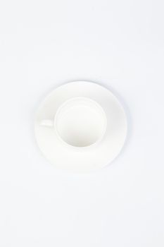 white coffee cup and saucer on white isolated background.