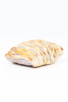 bread on white isolated background.Bread baked with a sweet fruit filling inside.
