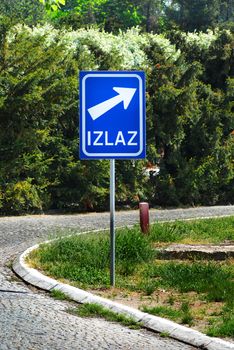 traffic blue direction sign for exit in serbian