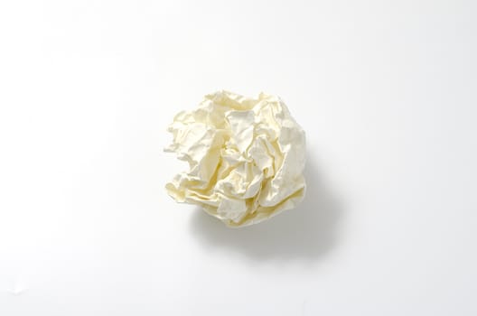 crumpled paper ball on a white background