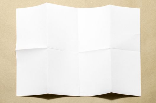 Empty white Crumpled paper on brown color background