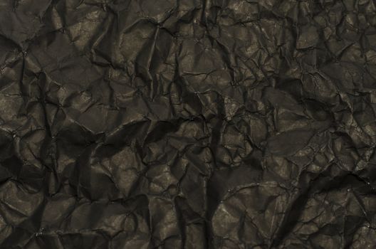 black crumpled paper texture background