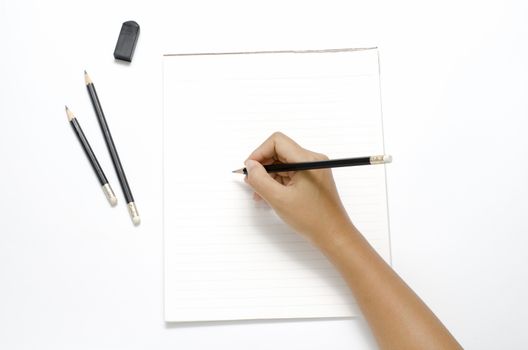 asia woman right hand writing with black pencil on paper over white background