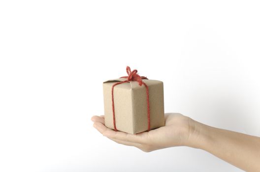 asia woman hand holding gift box on a white background