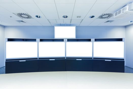 teleconferencing, video conference and telepresence business meeting room with blank screen display monitor