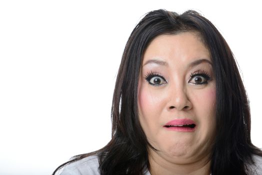 Closeup portrait of frightened and shocked asian woman isolated on white background. Negative emotions, facial expressions, feelings