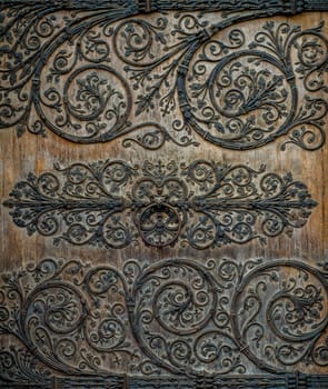 Ornate Metalwork On Door Of Medieval Notre Dame Cathedral In Paris France