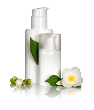 Face cream with jasmine flower on white background