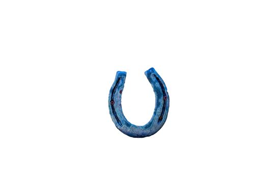 Old weathered horseshoes for good luck against a white background
