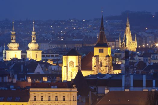 czech republic, prague - spires of churches of the old town at dusk