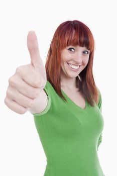 young cheerful woman showing thumbs up sign - isolated on white