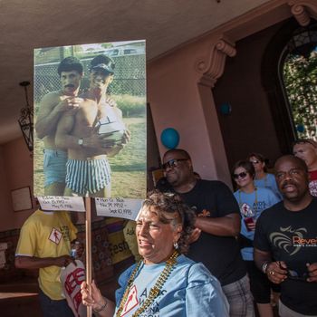 TUCSON, AZ/USA - OCTOBER 12:  Woman carrying memorial sign on October 12, 2014 in Tucson, Arizona, USA.