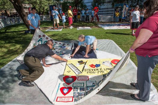 TUCSON, AZ/USA - OCTOBER 12:  Unidentifed people at AIDS Quilt Ceremony on October 12, 2014 in Tucson, Arizona, USA.