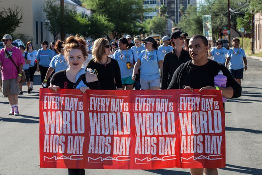 TUCSON, AZ/USA - OCTOBER 12:  Walker s with World AIDS Day sign at AIDSwalk on October 12, 2014 in Tucson, Arizona, USA.