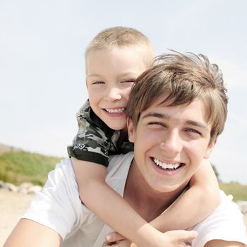 Happy Teenager and Kid Portrait outdoor