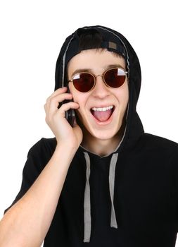 Cheerful Teenager with Cellphone Isolated on the White Background