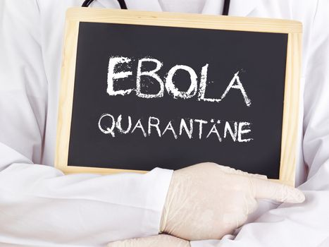 Doctor shows information: Ebola quarantine in german