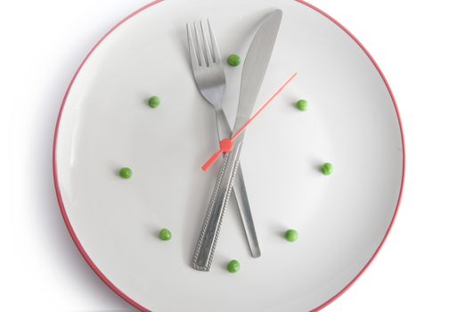 Plate in the form of a clock using cutlery 