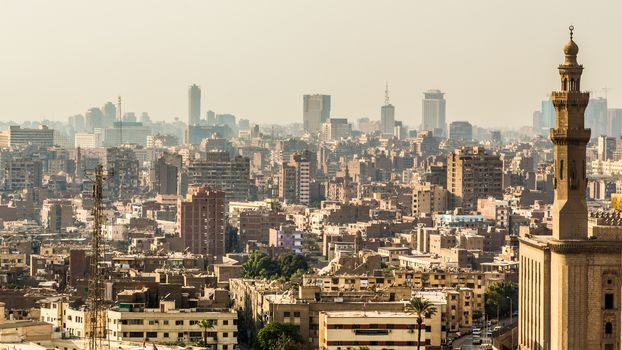 Aerial view of the city of Cairo with densely packed residential homes and buildings