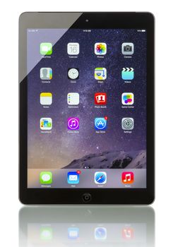 Galati, Romania - October 16, 2014: Apple iPad Air Wi‑Fi + Cellular displaying iOS 8 homescreen. iOS 8  operating system designed by Apple Inc. official output 16 October 2014. Launch Date of this fifth generation iPad was 1 November 2013.