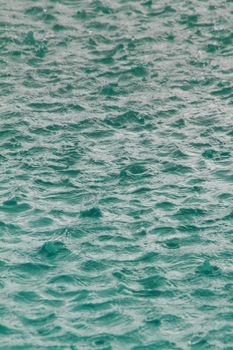 rain falling into a swimming pool