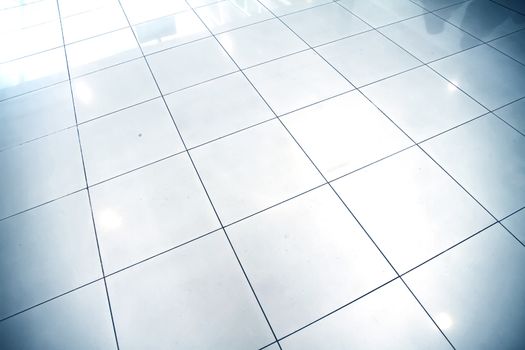 A reflective floor in a waiting hall.