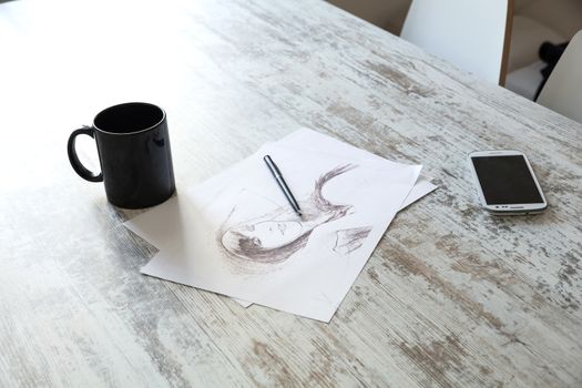 Drawing a sketch on the Table.