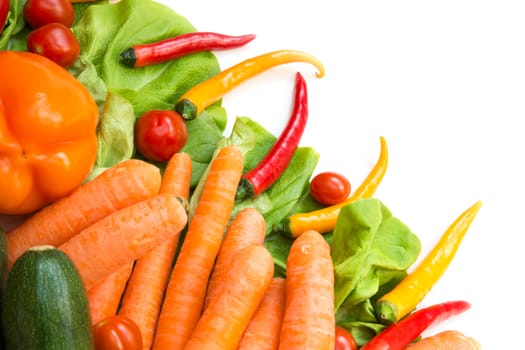 Various vegetables as a background isolated on white.