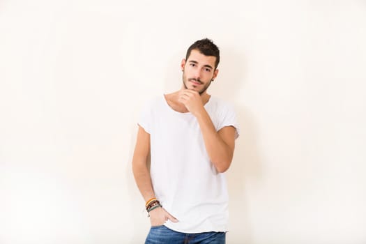 Portrait of a relaxed latin man in casual clothes.