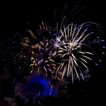 A close-up shot of sparkling Fireworks bursting out into beautiful shapes