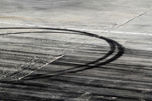 Background with tire marks on road track