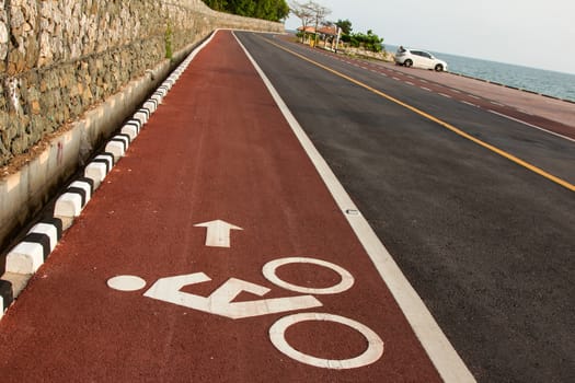 Bicycle road sign and arrow in outdoors