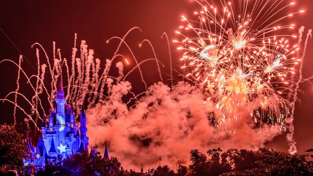 Orlando, Florida – Sept 4: The famous Wishes nighttime spectacular fireworks light up the sky at the Disney Magic Kingdom Castle in Orlando, Florida, on September 4, 2014