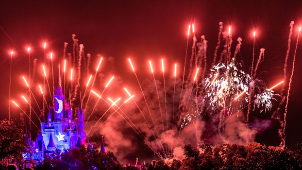 Orlando, Florida – Sept 4: The famous Wishes nighttime spectacular fireworks light up the sky at the Disney Magic Kingdom Castle in Orlando, Florida, on September 4, 2014