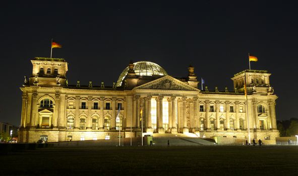 Frontal night view of Reichstag building Bundestag in Berlin, Germany, Europe.