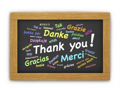 International thank you colorful text in different languages for thanksgiving concept on a wooden blackboard or chalkboard on white background.