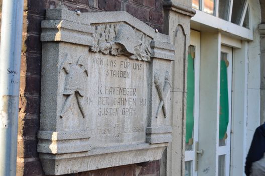 Plaque for men of the volunteer fire department. 
It is located at an old firehouse.