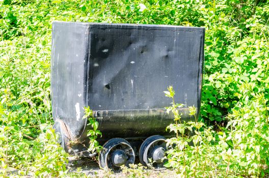 Old battered Mine cart almost zugewachsen.Die nature to bring everything back.