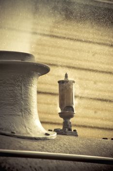 steam escaping from the funnel of a vintage railroad engine