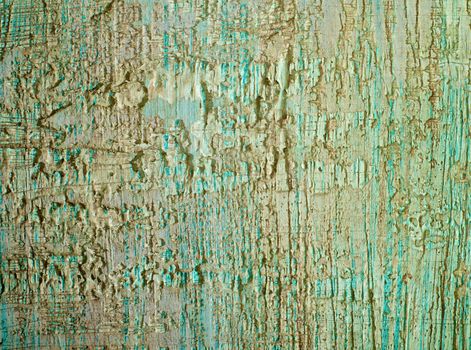 Blue and Beige Damaged Obsolete Textured Cement Wall Background closeup 
