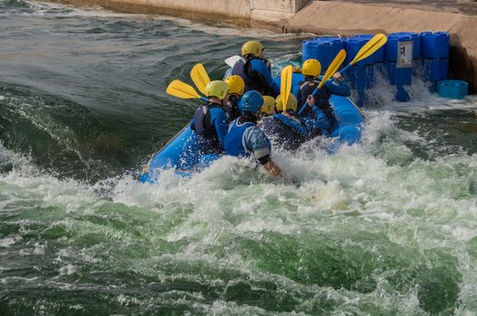 A rubber raft, taking on water, as it goes backwards through the rapids







A raft, taking on water, as it goes backwards through the rapids