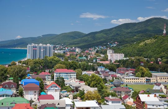 Mountains, trees and buildings at the coast of Black Sea