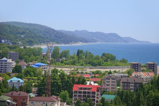 Mountains, trees and buildings at the coast of Black Sea