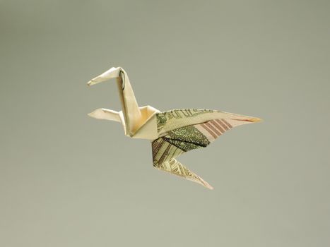 bird origami out of the money in the air