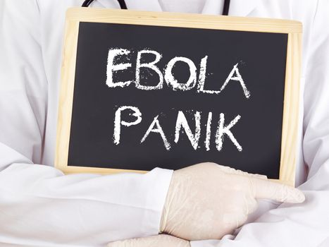 Doctor shows information: Ebola panic in german language
