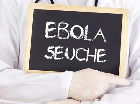 Doctor shows information: Ebola plague in german language
