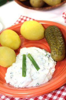 Potatoes with curd on a light background