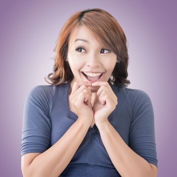 Surprised Asian woman, closeup portrait.